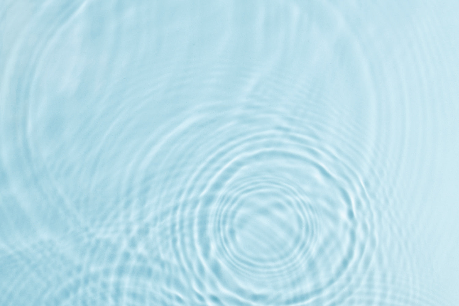 Soft water ripples background for nātelle pregnancy skincare hero